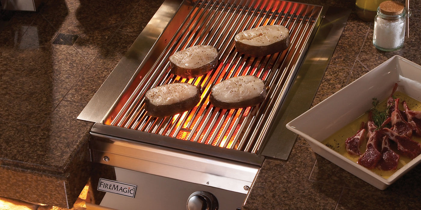 Adding a stainless steel side burner to your grill setup allows you to cook veggies, side dishes, and sauces while you grill your main grates.